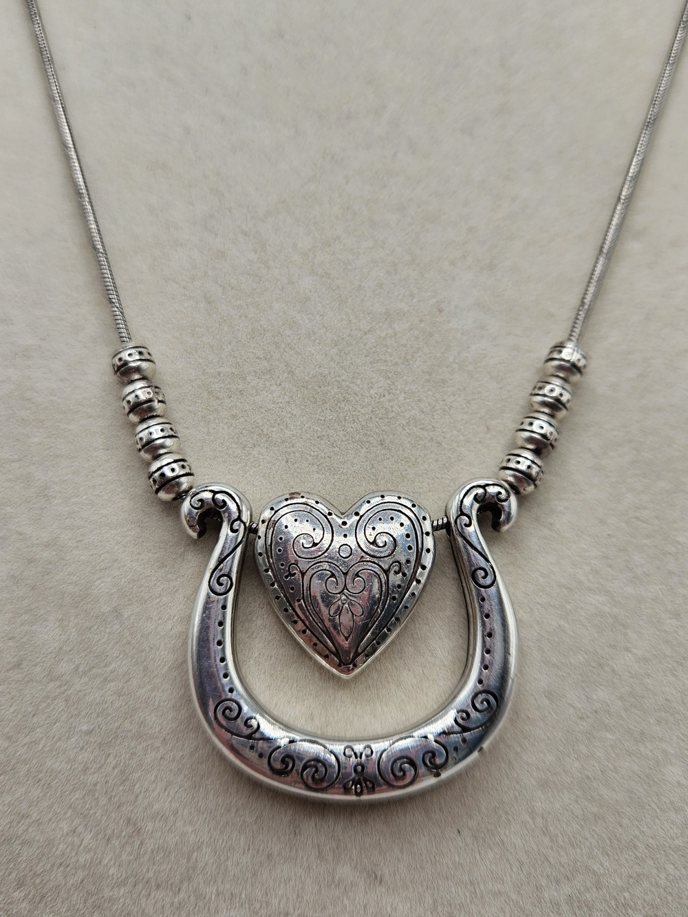 Brighton Silver Plated Swinging Etched Puffy Heart Double Sided Pendant Necklace